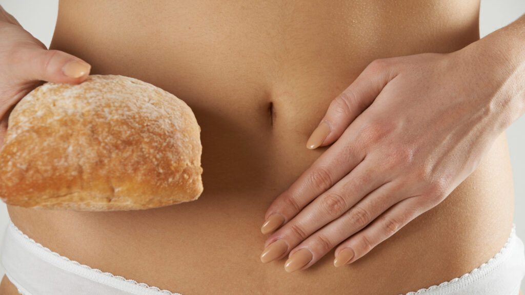 Hand-Bauch-istock