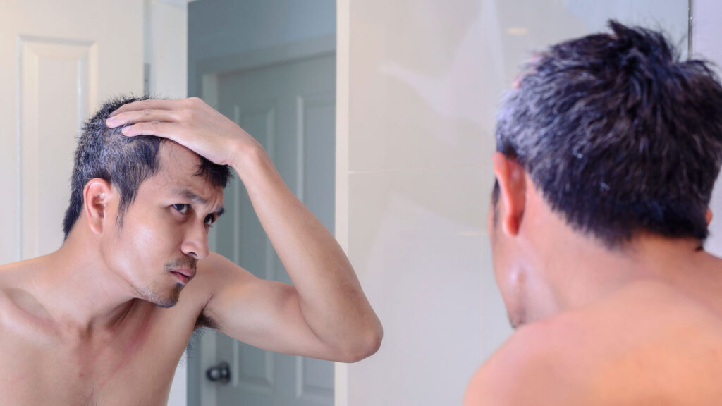Warum bekommen wir graue Haare?