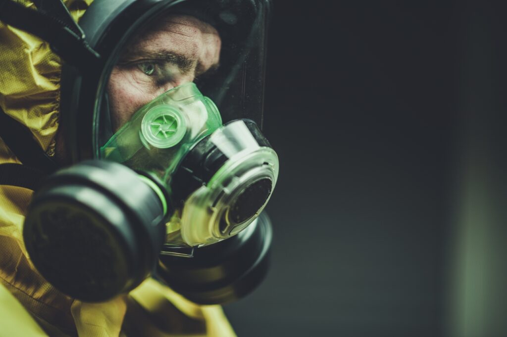 Caucasian Hospital Laboratory Worker in Chemical Lab Mask Fighting Virus Spreading. Closeup Photo. Respiratory Protection.
